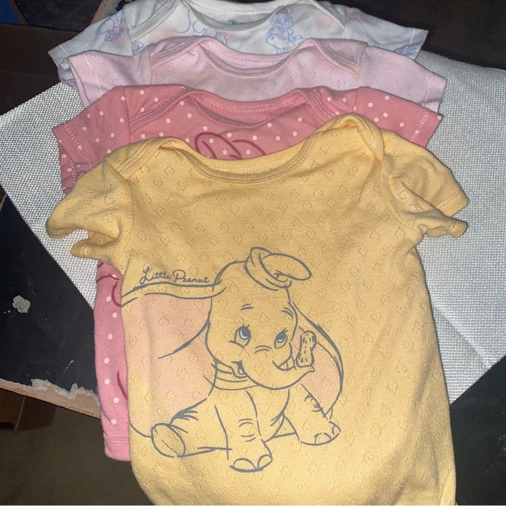 4 Disney baby onesies